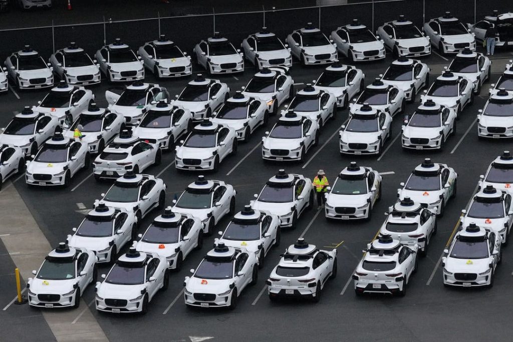 waymo cars on parking lot